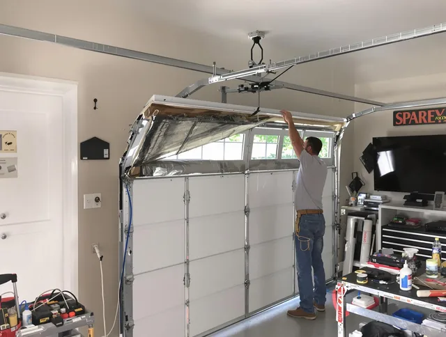 Garage door section replacement by The Hammocks Garage Door Repair in The Hammocks